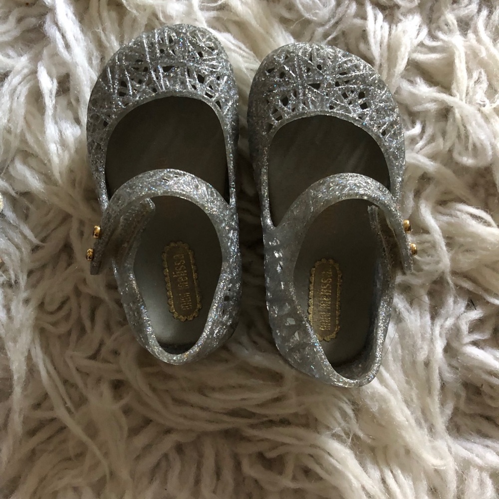 Two pairs of mini Melissa shoes